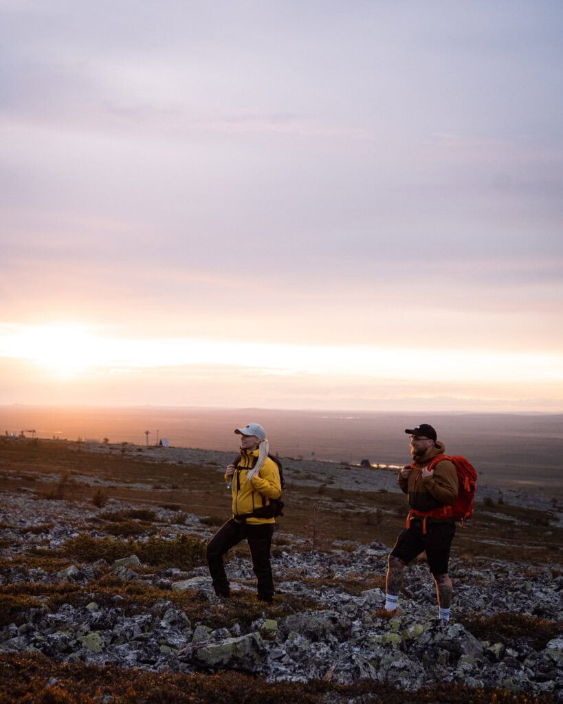 A couple hiking on top of the Luosto fell