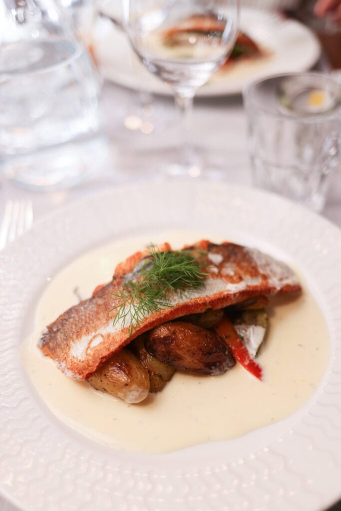 Fish dish in restaurant Aurora