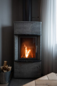 Lit fireplace in the room