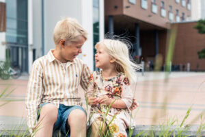 Kids laughing outside the hotel