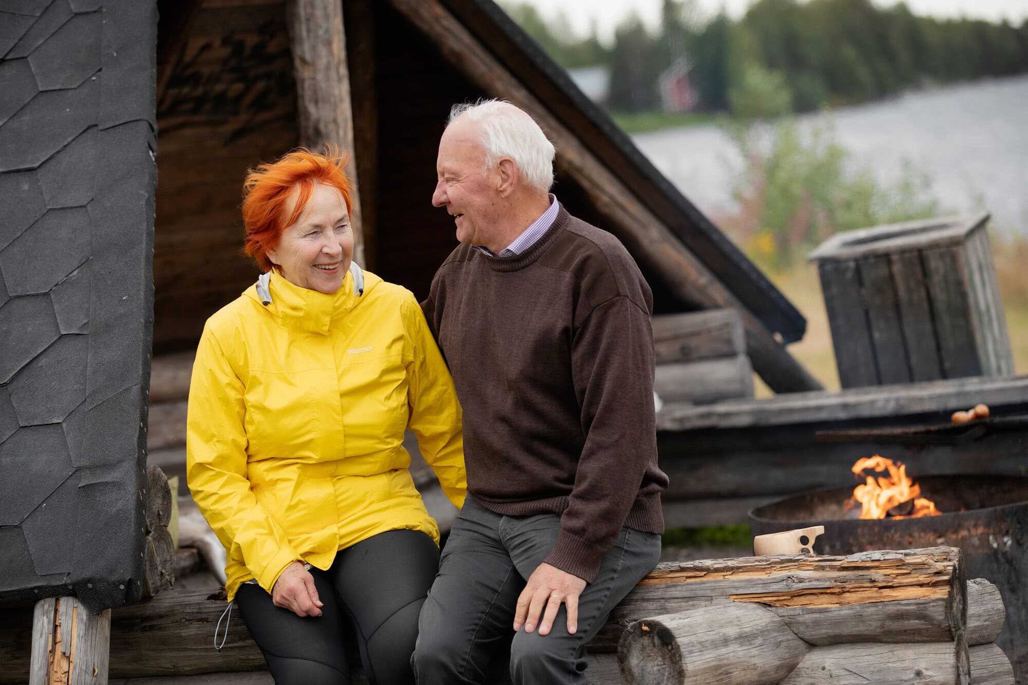 Elder couple sitting on a lean-to