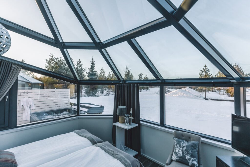 Premium Igloo with outdoor hot tub from inside with the hot tub peeking through the window